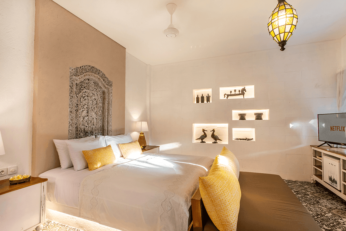 Cozy room interior at PinkPrivate Sanur adults-only hotel